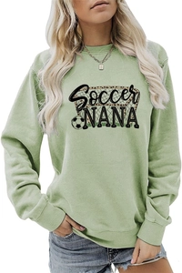 Detail of light green soccer nana crewneck sweatshirt styled with denim jeans