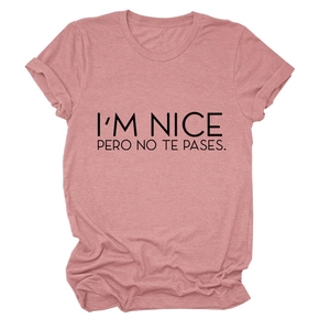 Macro detail of dusty pink crewneck T-shirt with black slogan print and fine fabric texture