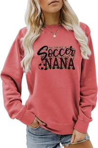 Detail of the Soccer NANA print on this loose-fit coral red crewneck sweatshirt