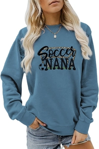 Detail of Soccer NANA graphic print on dusty blue crewneck sweatshirt fabric