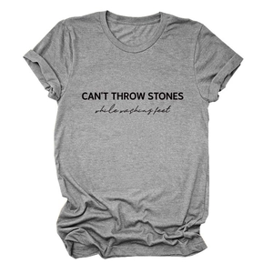 Detail of grey crewneck T-shirt showing CAN'T THROW STONES print and rolled cuffs