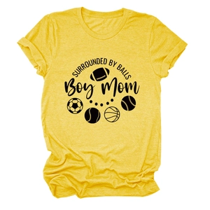 Detail of yellow round neck T-shirt with sports ball icons and Boy Mom slogan
