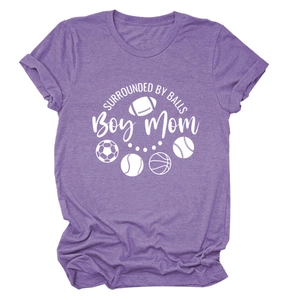 Close-up of Heather Purple Boy Mom t-shirt with sports balls graphics and white lettering