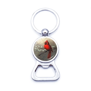 Detail of silver cardinal bird bottle opener keychain with glass gem bird illustration