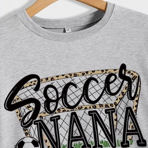 Grey Soccer Nana sweatshirt with leopard print text and soccer graphics on casual crewneck