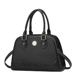 Minimalist black shell bag with herringbone fabric, leather trim and gold metal emblem