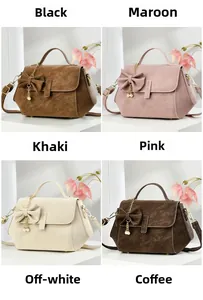 Detail view of stylish PU leather flap bags with bow pearl charms in six various colors