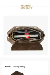 Detail view of the brown leather crossbody bag showing multiple inner compartments and gold zippers
