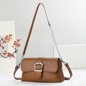 Elegant brown faux leather baguette bag with silver metal buckle and chain strap