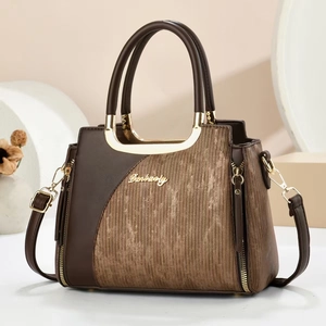 Elegant dark brown tote bag with smooth texture and gold metal handles for women