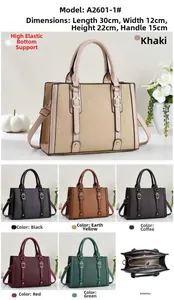 Detailed internal structure and textured faux leather weave of this large tote handbag