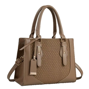 Clay brown leather tote bag with stylish herringbone knit panel and top handles