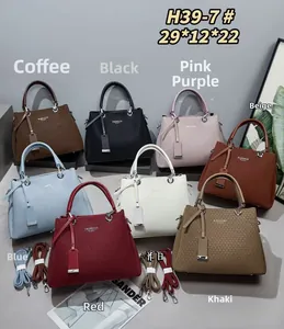 Detailed close-up of textured tote bags in eight diverse colors with fashion logo