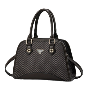Classic brown shell handbag featuring herringbone pattern fabric and adjustable strap