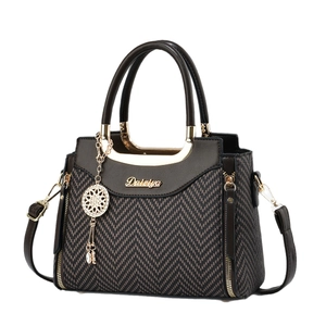 Elegante Handtasche aus braunem Leder und Fischgrätgewebe mit verstellbarem Schultergurt