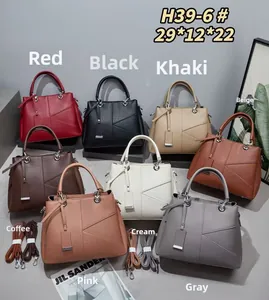 Detailed view of women's geometric paneled handbags in eight colors with 29x12x22 cm size
