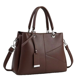 Classic dark brown top-handle bag with pebble leather and geometric stitching detail