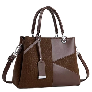 Elegante borsa marrone in pelle e tessuto con manici in argento e tracolla rimovibile
