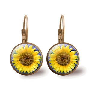 Vintage bronze lever-back earrings featuring a sunflower glass cabochon design