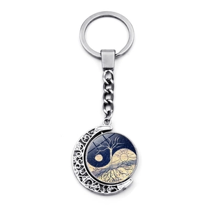 Moon shaped silver keychain with yin yang tree of life rotating glass pendant