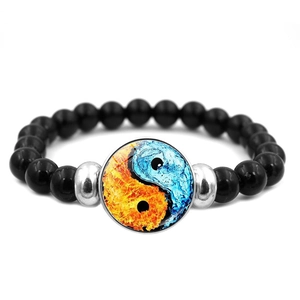 Black beaded Ying Yang bracelet featuring water and fire dragon elements on white background