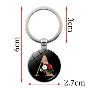 Silver alphabet keychain with letter A, floral motif and time gem dome, 6cm total length