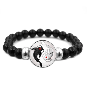 Yin Yang Koi Fish beaded bracelet with black polished stones and silver spacer beads