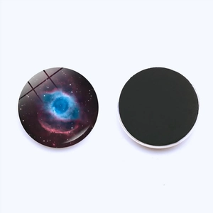 Detailed front and back view of a 25mm Helix Nebula crystal glass fridge magnet