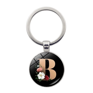 Zinc alloy keychain featuring a glass pendant with rose gold letter B and floral design