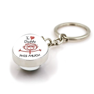 Silver metal I Love Daddy keychain with round glass pendant showing cartoon hearts on white