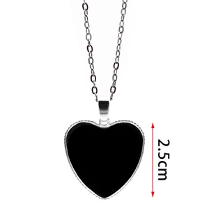 Silver heart pendant necklace with black center and 2.5cm pendant height on O-chain