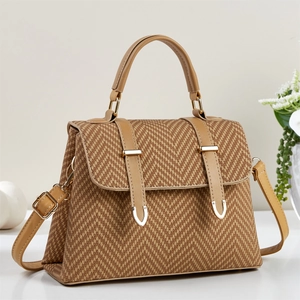 Elegant brown woven crossbody bag for women with leather straps and gold metal accents