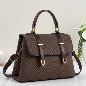 Elegant brown herringbone textured handbag for women with adjustable leather strap