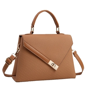 Brown herringbone handbag with leather trim and gold twist lock in front view