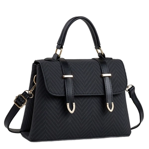 Elegant black textured handbag for women with gold hardware and adjustable strap