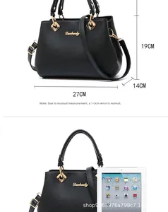 Size comparison of a black faux leather handbag with an iPad for scale and dimensions