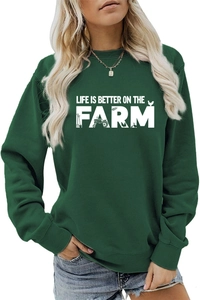 Detailed view of white Life is Better on the Farm print on dark green casual sweatshirt