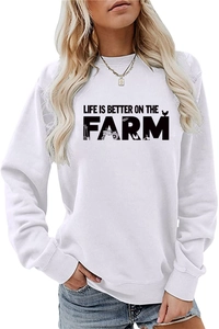 Close-up of Life Is Better On The Farm slogan print and tractor graphic on white sweatshirt