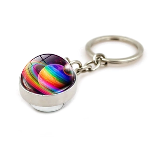 Solar system galaxy keychain with double-sided glass orb featuring nebula cosmic patterns