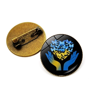 Broche cœur papillon bleu et jaune avec tournesol et épingle en métal bronze