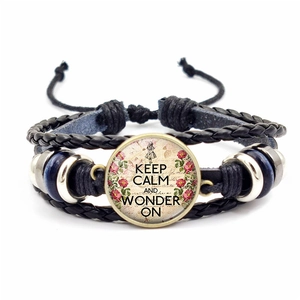 Retro multi-layer woven leather bracelet featuring Keep Calm and Wonder On motivational quote