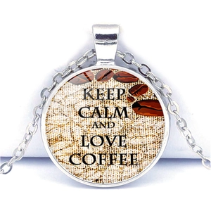 Keep Calm and Love Coffee necklace with silver glass dome pendant on white background