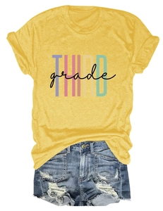 Flat lay of a yellow round neck T-shirt featuring 'THIRD grade' colorful letter print