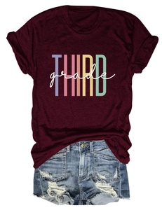 Detail of burgundy T-shirt with Third Grade print and frayed denim shorts set
