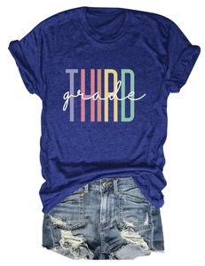 Close-up of Third Grade typography on a dark blue heather t-shirt with ripped denim shorts