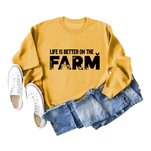 Mustard yellow Life Is Better On The Farm sweatshirt with tractor and rooster graphic print