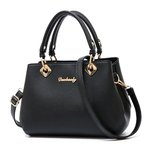 Elegant black lychee grain handbag for women with gold hardware and shoulder strap