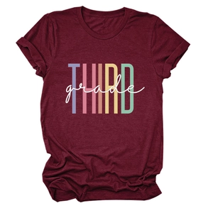Detail of burgundy T-shirt showing THIRD grade colorful print with white script text