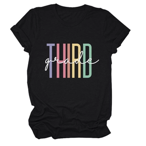 Detail of colorful Third Grade graphic print on a black cotton short sleeve T-shirt