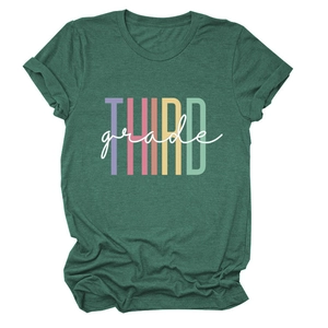 Detail of dark green t-shirt with THIRD grade colorful graphic print and rolled sleeves